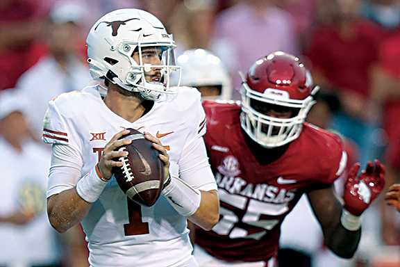 Texas QB Hudson Card against Arkansas.